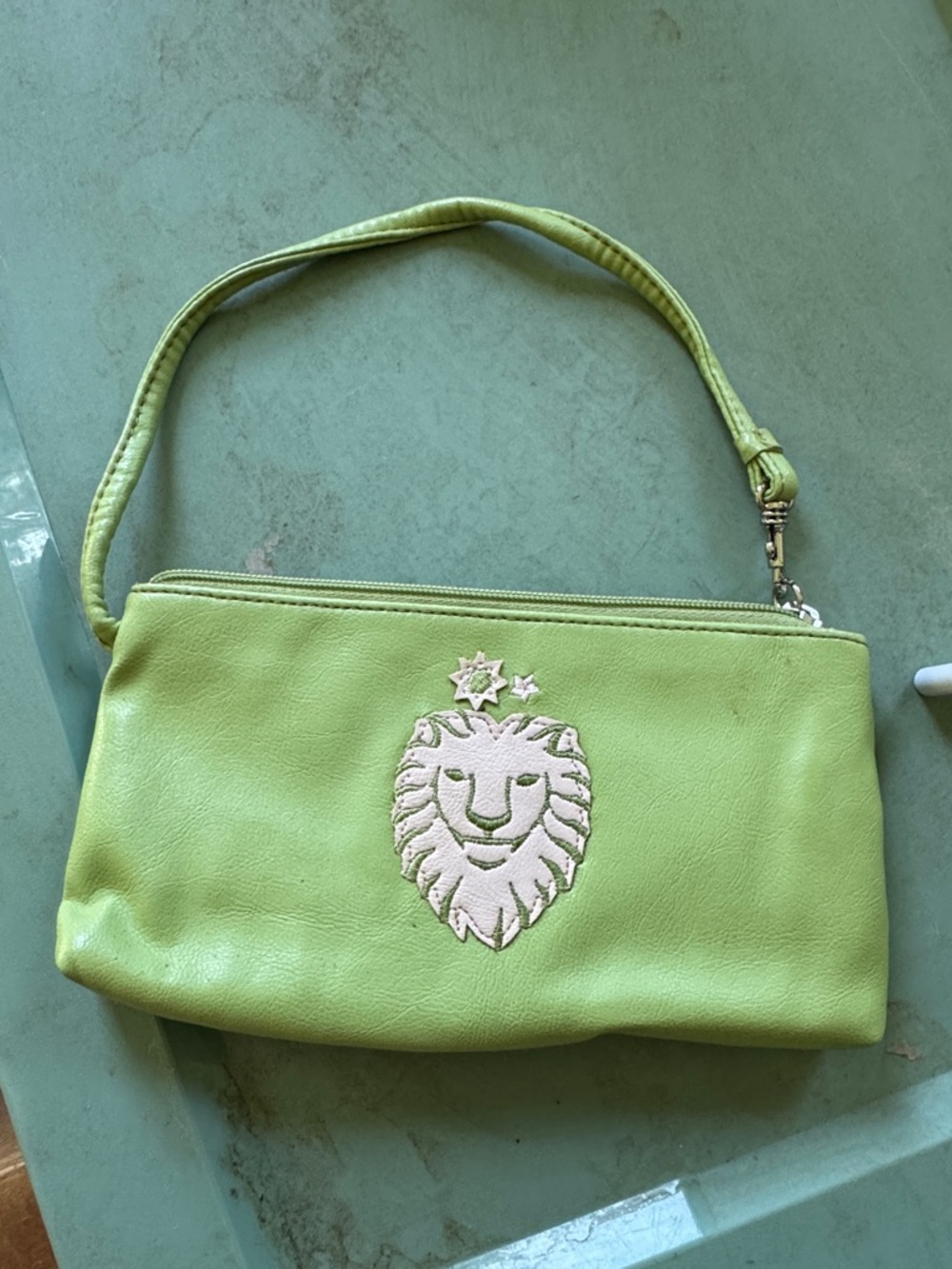 NWOT Clutch Bag Zipper LION LEATHER  
10” X 6” -18” Handle Clip on one end LION